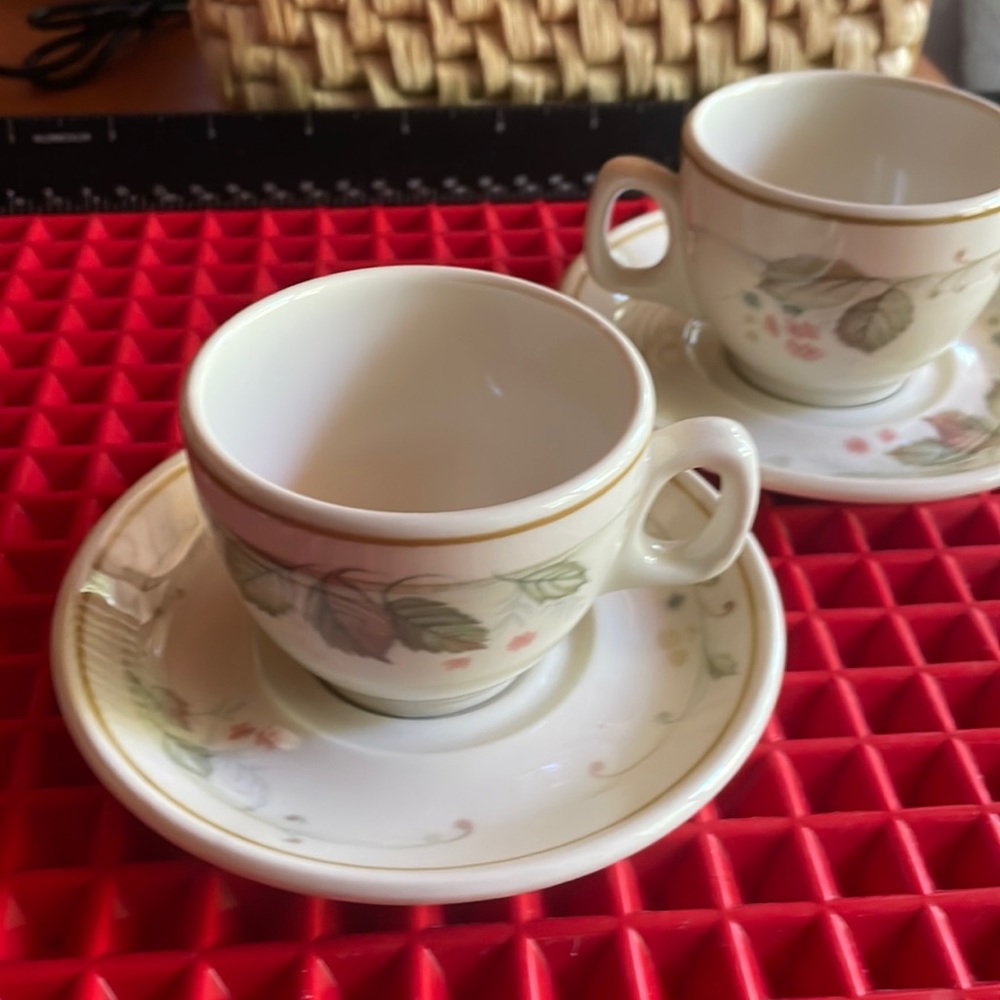 PAIR OF STEELITE DEMITASSE FLORAL TEACUPS AND SAUCERS